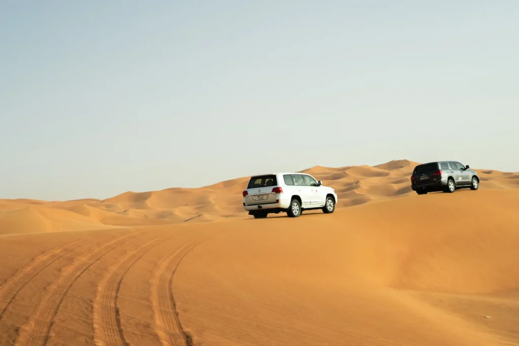 Evening desert safari experience in Dubai with dunes and camel rides in 2026